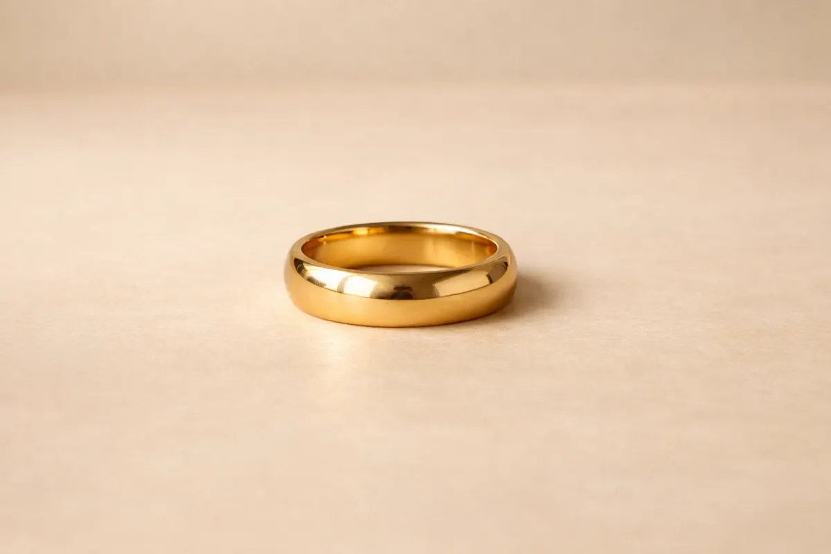 Gold ring on a neutral background for photo identification